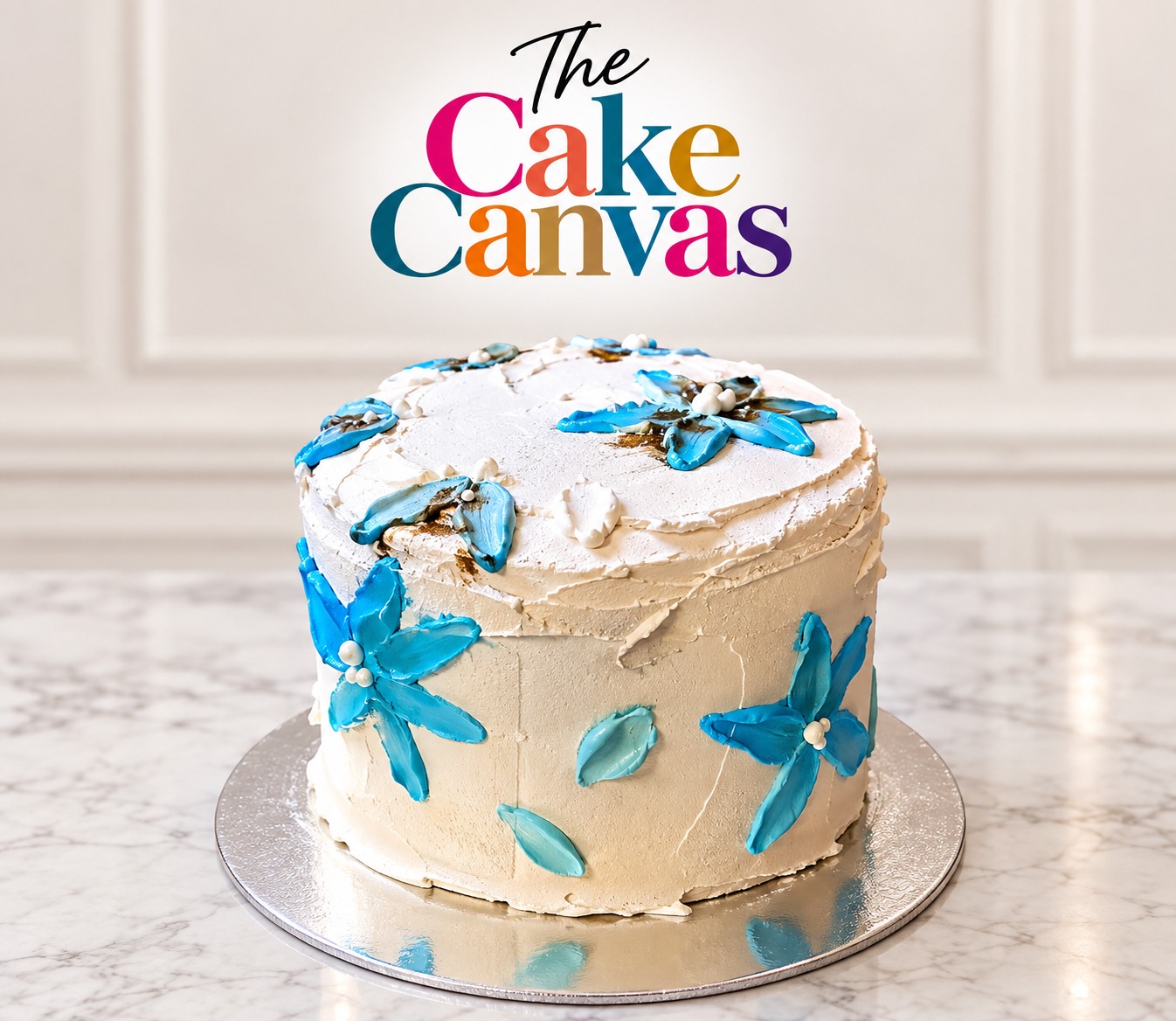 White and blue floral cake by The Cake Canvas